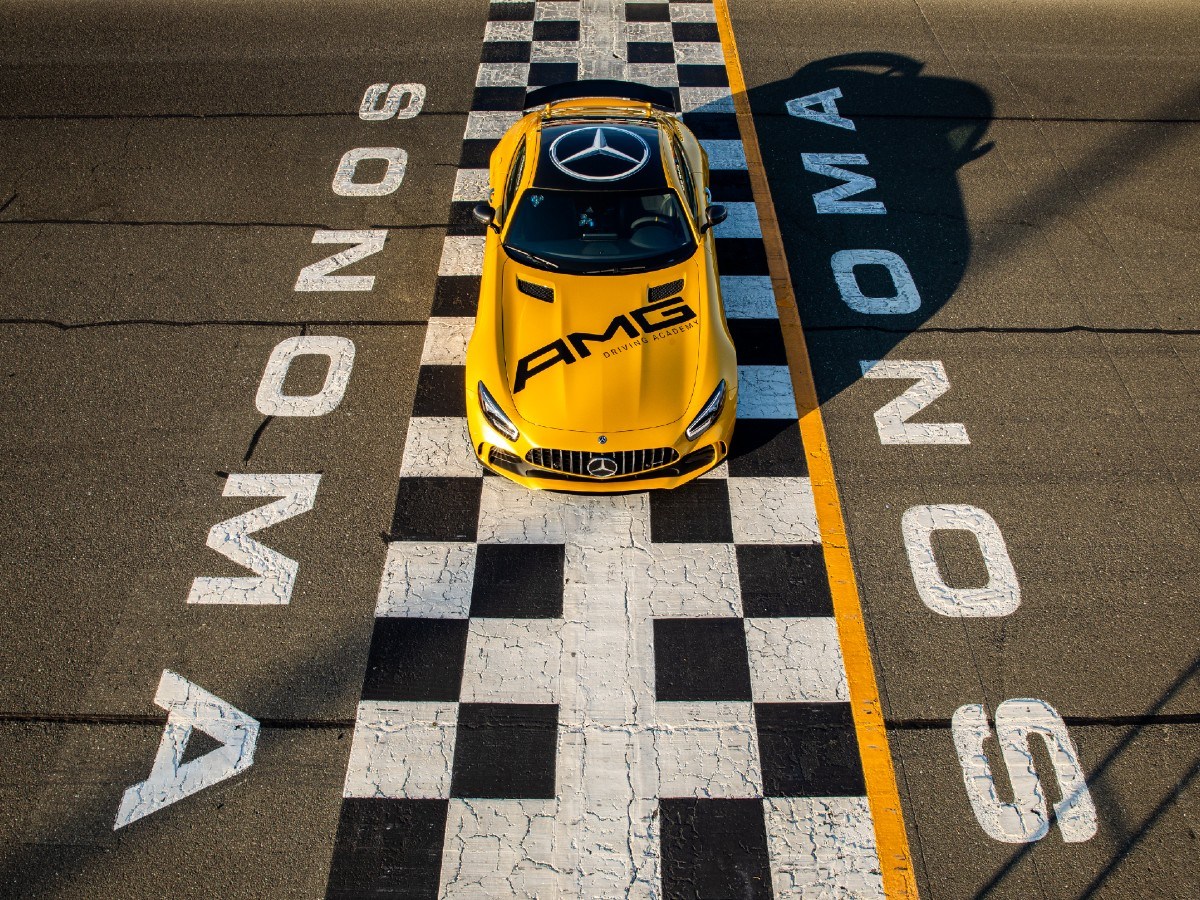 Close-up view of blue & yellow rumble strip at Sonoma Raceway Track