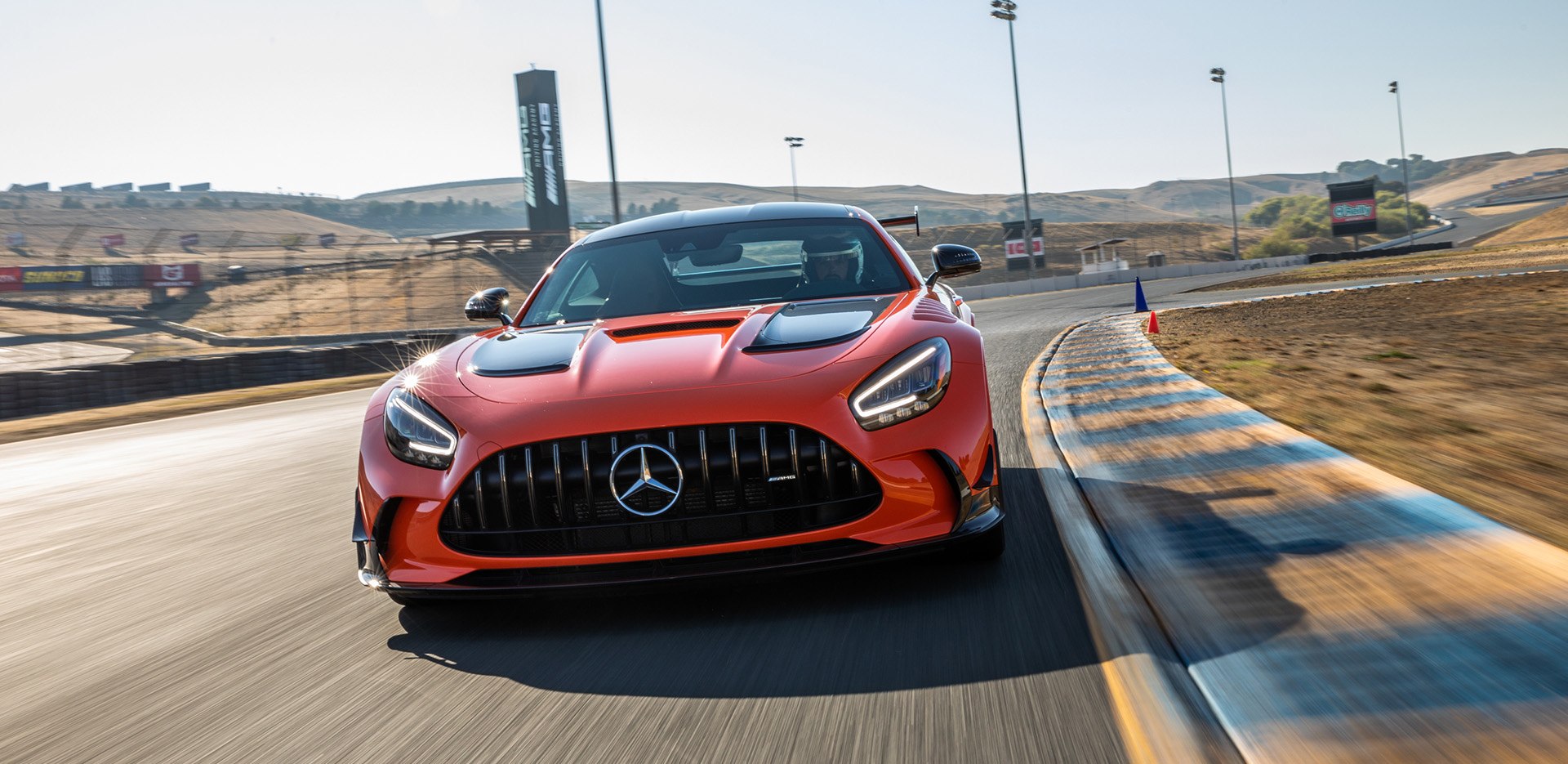 Red Mercedes AMG Vehicle  on Sonoma Raceway Track